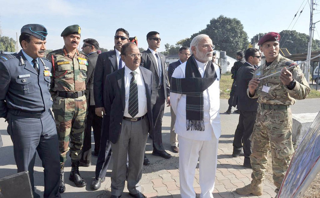 Prime Minister Narendra Modi (second from right) with National Security Advisor Ajit Doval (Centre) visiting Pathankot air base after the terrorist attack at the base. Photo: UNI