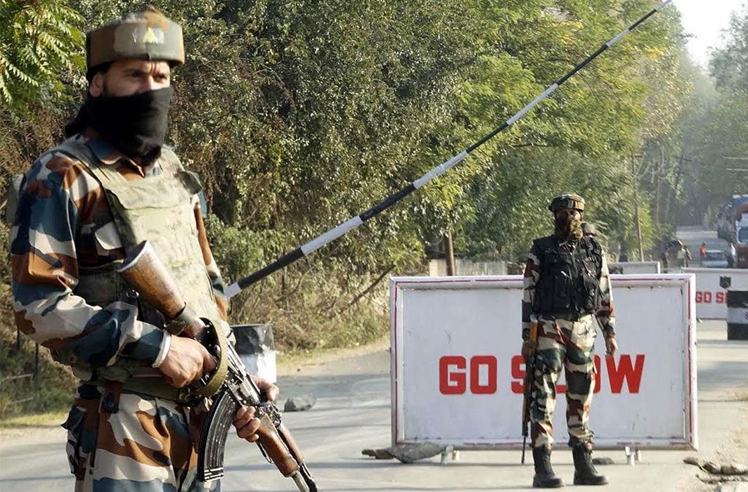 Army jawans keeping strict vigil at the main gate of the Army Camp of 46-RR, at Janbazpora in Baramulla district, Jammu and Kashmir