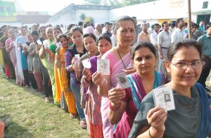 People queuing up at a polling booth in Moradabad, UP. Photo: UNI