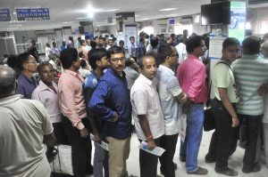 People standing in long queues to exchange their old notes at a bank in Agartala. Photo: UNI