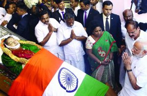 Prime Minister Narendra Modi paying tributes to the mortal remains of J Jayalalithaa, in Chennai. Photo: UNI