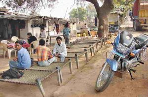 highway commuters take a break at a dhaba.