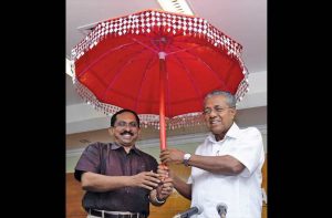 (L-R) Ajith Kumar, Mangalam TV CEO with Kerala CM Pinarayi Vijayan