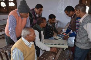 Polling officers with EVMs at a training camp ahead of the 2017 Uttar Pradesh assembly polls. Photo: UNI