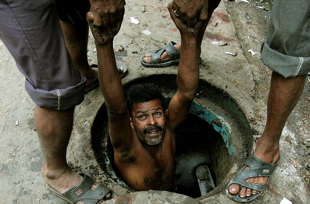 Manual scavengers, most of them from the Dalit community, work in the most inhuman conditions