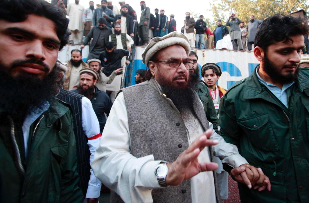 Hafiz Saeed, Lashkar-e-Taiba founder, exits after addressing his supporters during a protest against satirical French weekly newspaper Charlie Hebdo (file photo). Photo: UNI