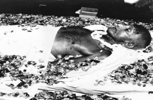 The body of Mahatma Gandhi lying at Birla House in New Delhi. Photo: oldindianphotos.in