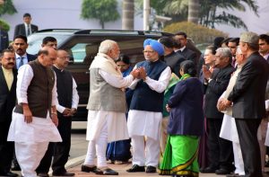 After bitter spat, Narendra Modi greets Manmohan Singh at Parliament
