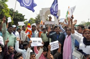 Members of Dalit organisations raising slogans during Bharat Bandh over SC/ST issue, in Lucknow on Monday/Photo: UNI