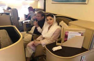 Nawaz Sharif and Maryam on an Etihad Airways flight on the way to Lahore/Photo: Twitter