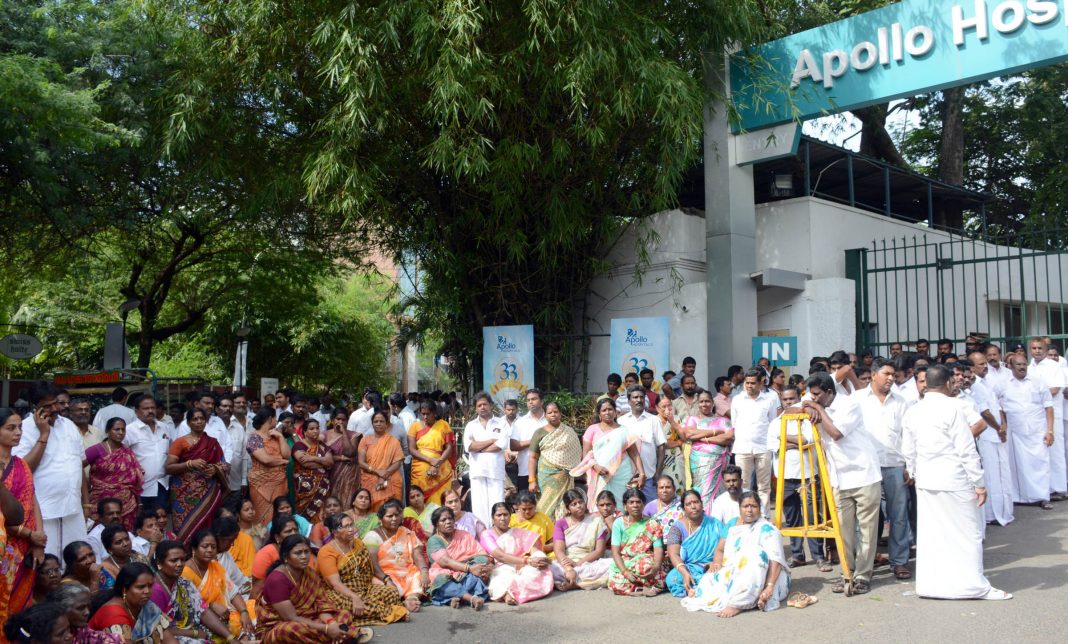 AIADMK ministers, functionaries and cadres in front of the Apollo Hospitals where party chief J Jayalalithaa was admitted/Photo: UNI