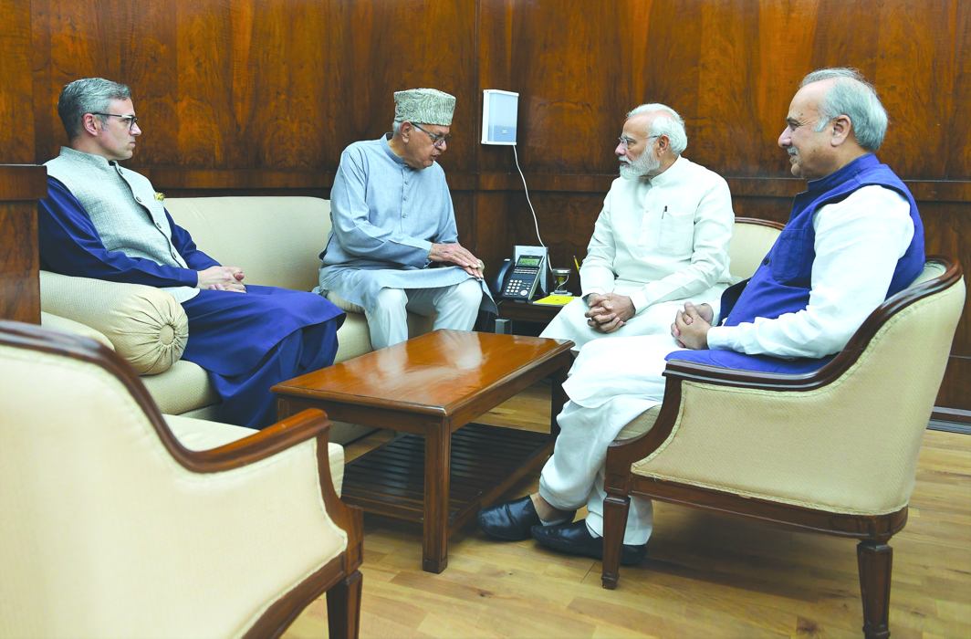 National Conference leaders Omar Abdullah (left), Farooq Abdullah (second from left) and MP Justice (retd.) Hasnain Masoodi meeting Prime Minister Modi in New Delhi on Aug 1/Photo: PMO/Twitter