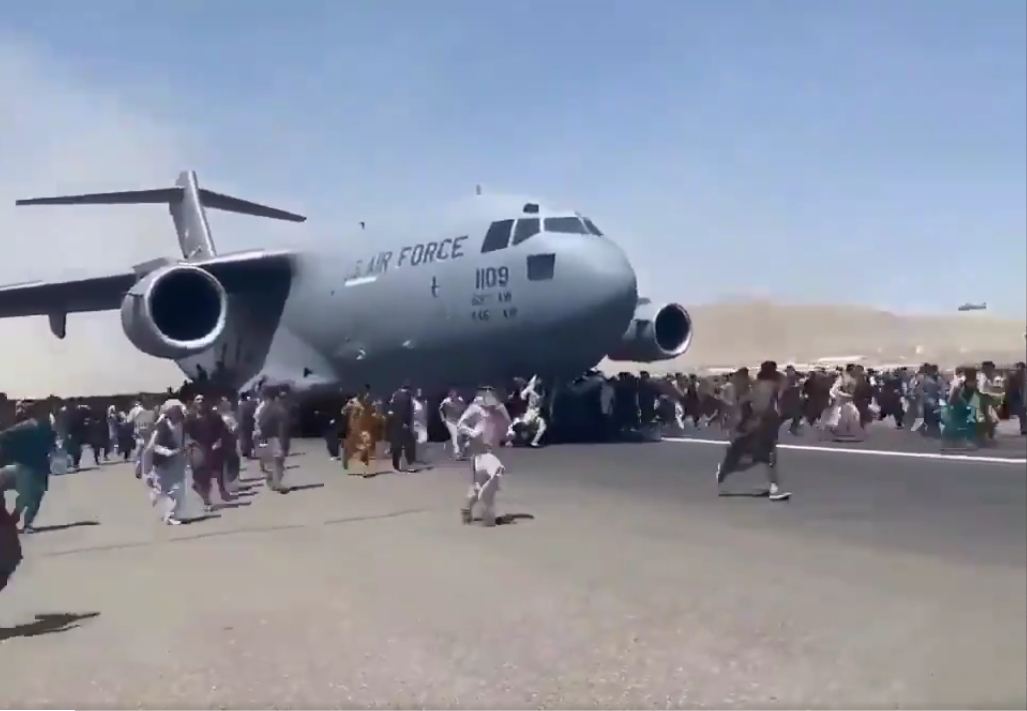 USAF C-17 Globemaster & People of Afghanistan at Kabul Airport.