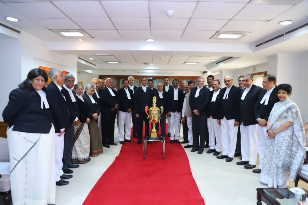 Chief Justice of India-XI celebrate their maiden victory in the annual cricket match
