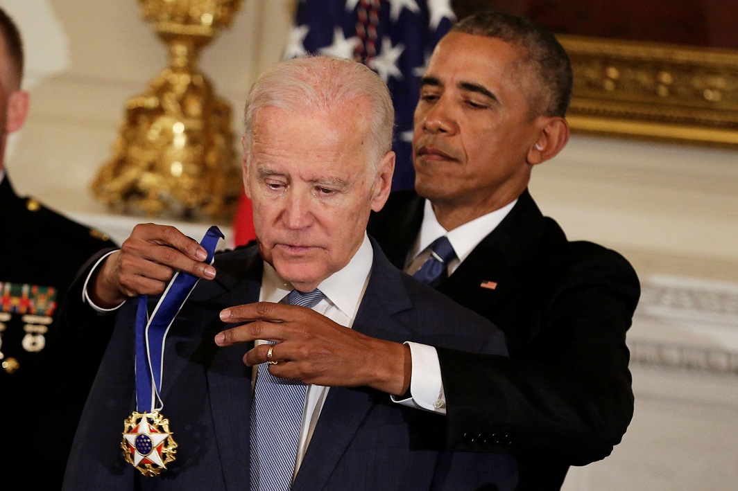 GOODBYE GIFT: US President Barack Obama presents the Presidential Medal of Freedom to Vice President Joe Biden in the State Dining Room of the White House in Washington, January 12, Reuters/UNI