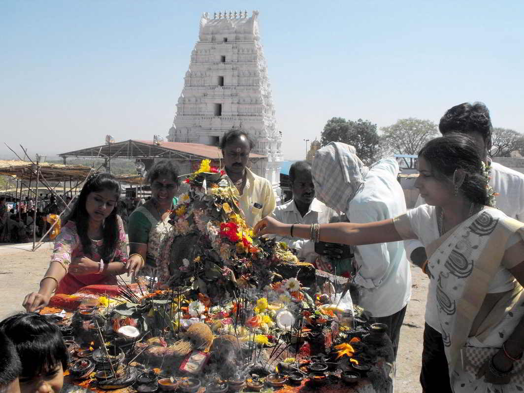 IDOL WORSHIP: Devotees perform worship rituals on the occasion of Mahashivratri festival at Keesraguta temple in Hyderabad, UNI