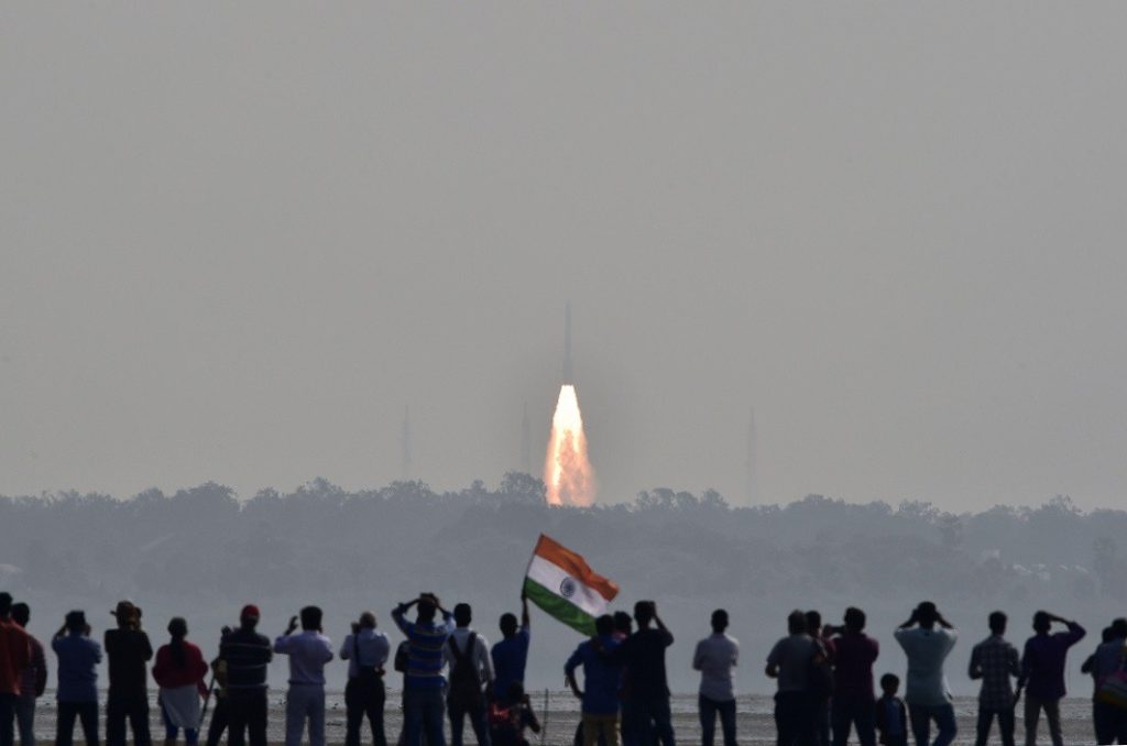 Onlookers watch PSLV-C37 lift off from the Satish Dhawan Space Centre in Sriharikota on the morning of February 15, Reuters/UNI