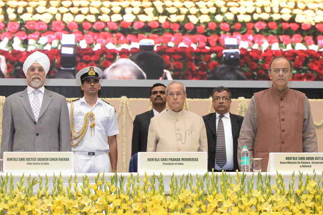 UNITED STAND: President Pranab Mukherjee flanked by Chief Justice of India Jagdish Singh Khehar and Union Finance Minister Arun Jaitley at the World Conference on Environment in New Delhi, UNI