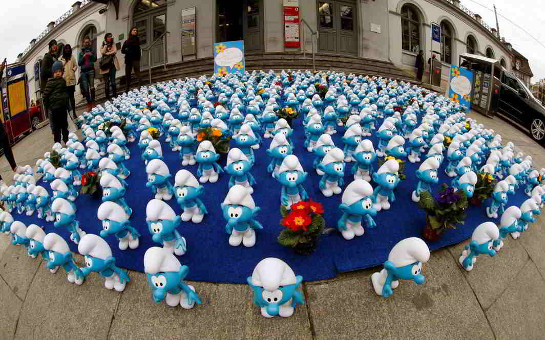 LITTLE BLUE MEN: Smurf dolls are placed to promote the new 3D computer-animated movie Die Schluempfe: Das Verlorene Dorf (The Smurfs: The Lost Village) in front of Stadelhof railway station in Zurich, Reuters/UNI