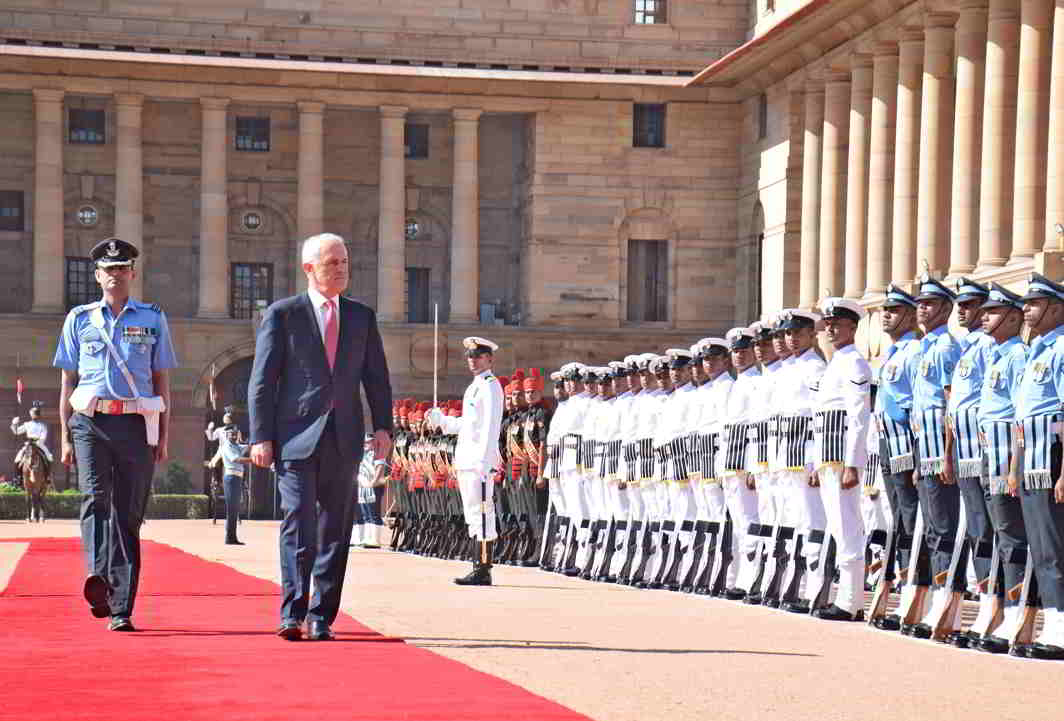 NEW GUEST IN TOWN: Prime Minister of Australia Malcolm Turnbull inspects a guard of honour during a reception at Rashtrapati Bhavan in New Delhi, UNI