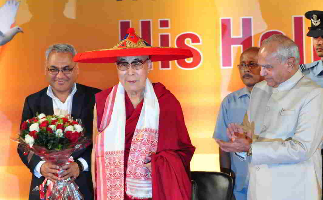 GOOD DAY: Tibetan spiritual leader Dalai Lama felicitated with an Assamese Japi during Platinum Jubilee of Assam Tribune Group in Guwahati, UNI