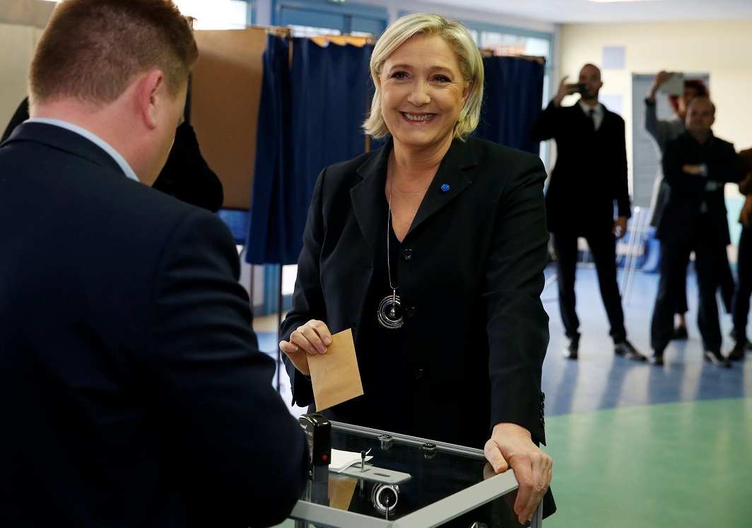 Le Pen casts her vote during the first round of presidential elections