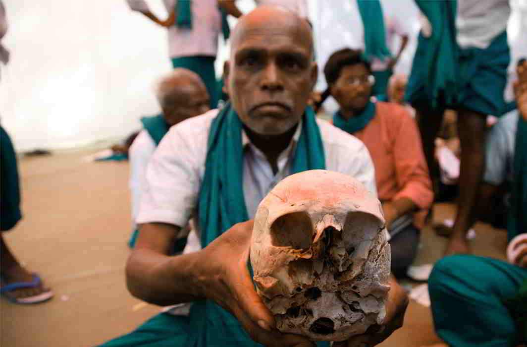 WHO WILL STAND BY THEM? Farmers from Tamil Nadu protest at Jantar Mantar, holding skulls belonging to their brethren who committed suicide. They are demanding a drought relief fund, better irrigation facilities and freedom from debt. The Madras HC has told the state government this week to waive loans of all farmers, Anil Shakya