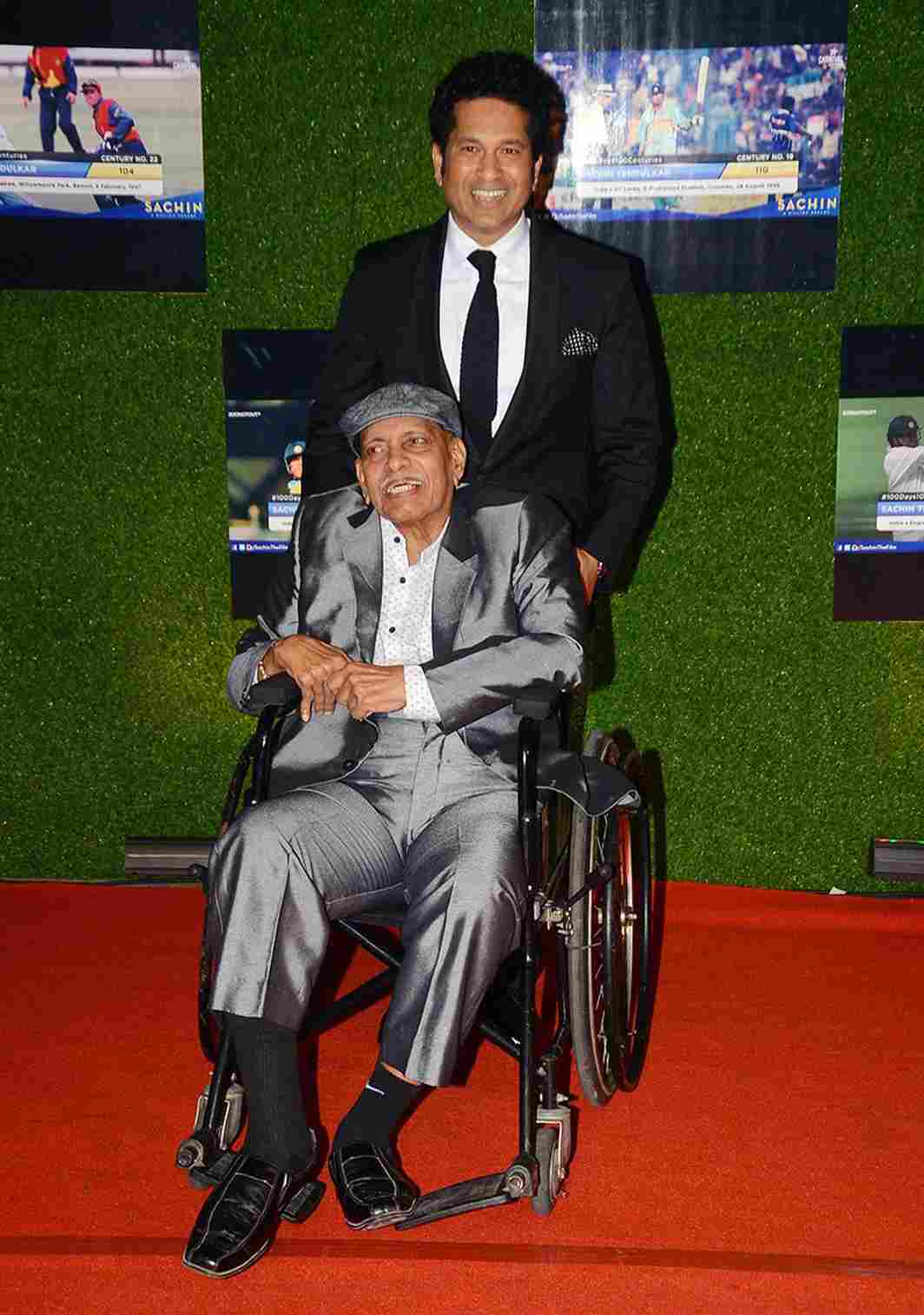 REAL DREAMS: Former cricketer Sachin Tendulkar with his coach Ramakant Achrekar during the premiere of film 'Sachin: A Billion Dreams', in Mumbai, UNI