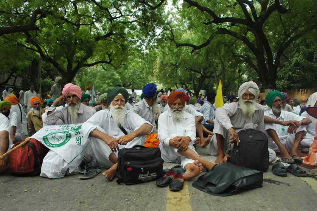 HELOTS WE ARE NOT: Farmers shout slogans during a protest organised by Rastriya Kisan Mahashangna (RKM) in favour of their demands , in New Delhi, UNI