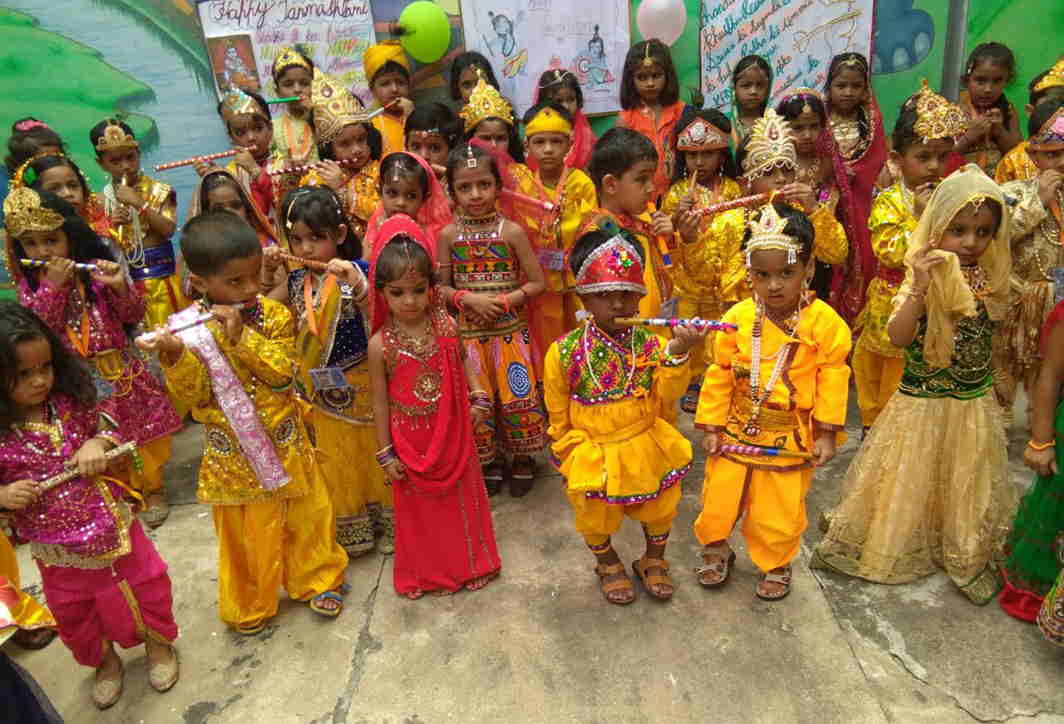 LITTLE KRISHNAS: Schoolchildren dressed-up as Lord Krishna and Sri Radha during Janmashtami celebrations at their school in Mirzapur, UNI