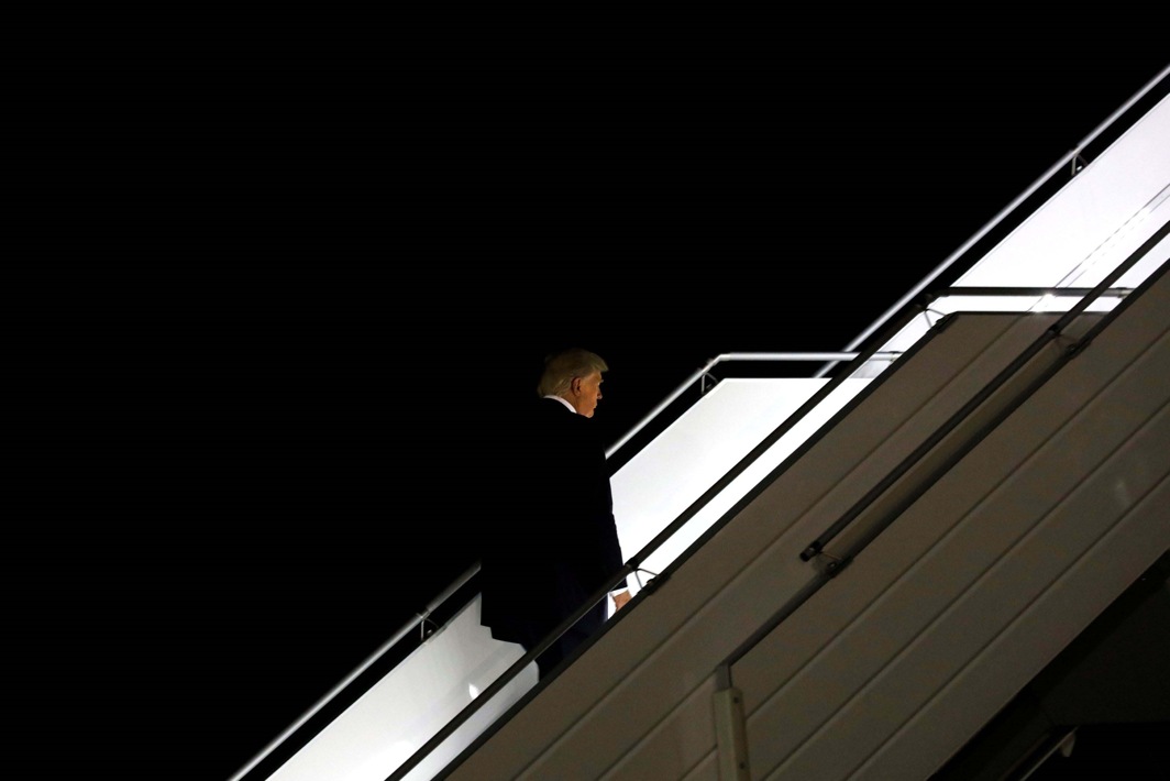 GOES THE PRESIDENT: US President Donald Trump boards Air Force One for travel to Washington, from JFK International airport in New York, Reuters/UNI