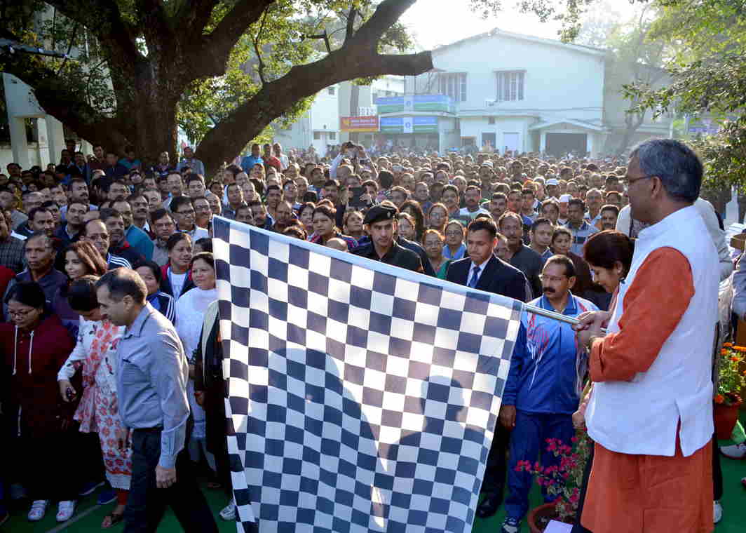 FOR A WORTHY CAUSE: Uttarakhand Chief Minister Trivendra Singh Rawat flags off the 'Run For Good Governance', in Dehradun, UNI