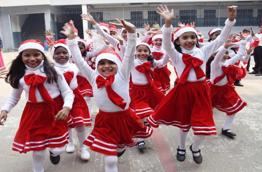 JOYFUL, JOYFUL: Children celebrate Christmas in school in Patna, UNI