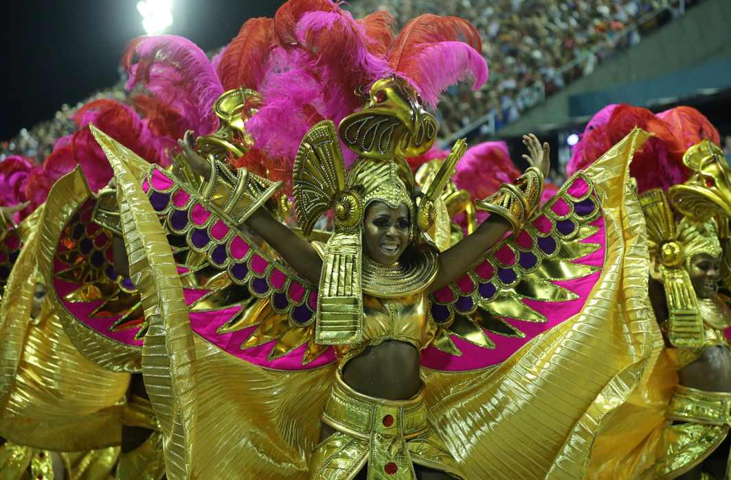 COVERED IN GOLD: A reveller from Salgueiro performs during the second night of the Carnival parade at the Sambadrome in Rio de Janeiro, Brazil, Reuters/UNI