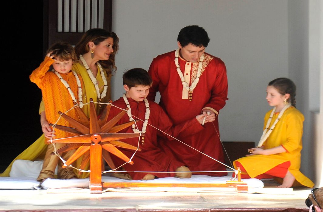 SPIN THE WHEEL: Canadian Prime Minister Justin Trudeau along with his wife Sophie Grégoire and children visits the Sabarmati Gandhi Ashram, in Ahmedabad, UNI