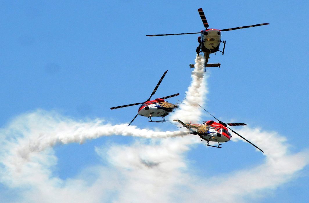 ACROBATICS: A Sarang helicopter display team of the Indian Air Force performs during the DefExpo-2018 at Thiruvidanthai, about 50 km from Chennai, UNI