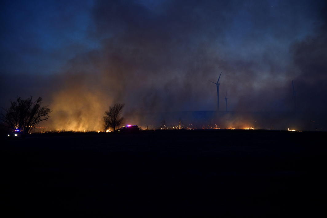 THE STRUGGLE IS REAL Firefighters struggle to fight the Rhea fire into