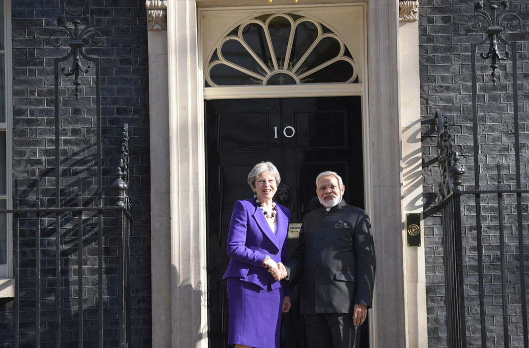 TWO’S COMPANY: Prime Minister Narendra Modi meets Theresa May, Prime Minister of the United Kingdom, at 10 Downing Street, London, UNI