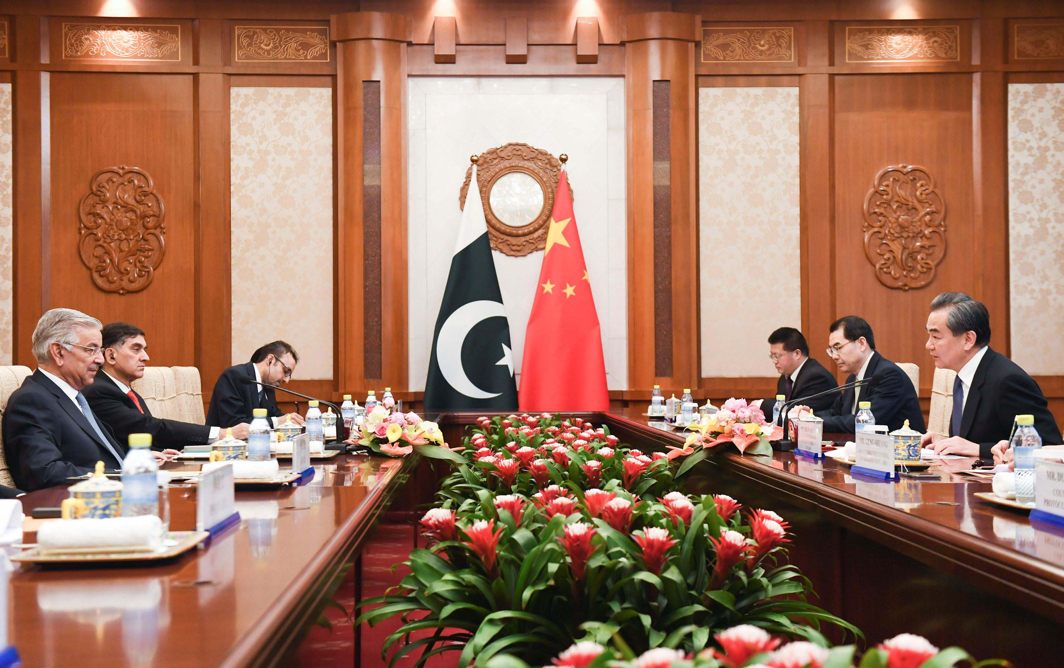 Pakistan's Foreign Minister Khawaja Muhammad Asif (left) and Chinese State Councilor and Foreign Minister Wang Yi (right) have a meeting at the Diaoyutai State Guest House in Beijing, China, Madoka Ikegami/Reuters/UNI