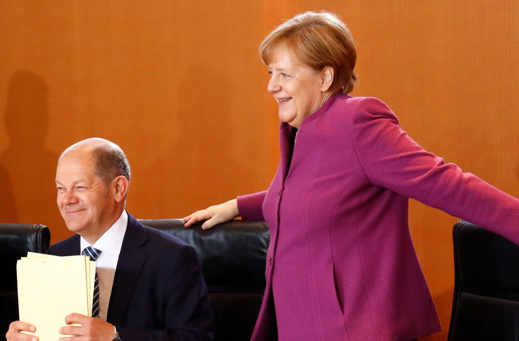 German Chancellor Angela Merkel and Finance Minister and vice-chancellor Olaf Scholz attend the weekly cabinet meeting in Berlin, Germany, Reuters/UNI