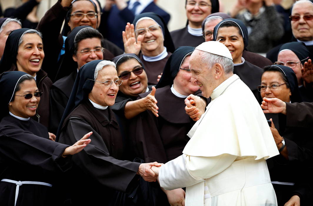 Pope Francis greets a group of nuns at the end of his Wednesday general audience in Saint Peter's square at the Vatican, Reuters/UNI