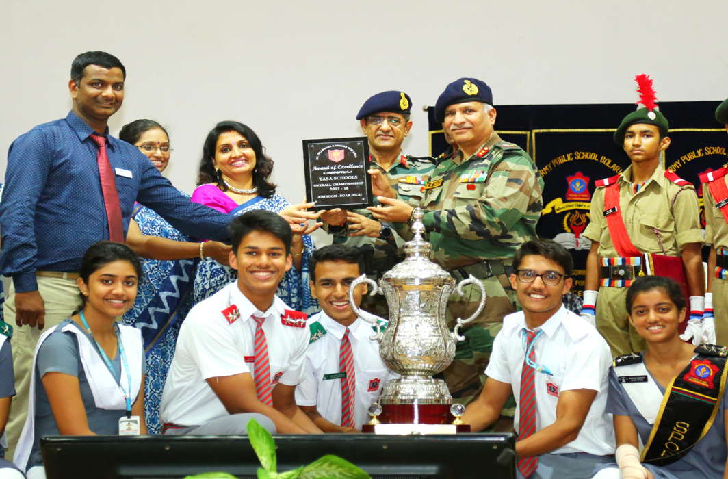Maj Gen N Srinivas Rao, GOC, Telangana and Andhra Pradesh Sub Area (TASA), presents the TASA School Champions Trophy to the winner Army Public School, Bolarum, at MCEME Auditorium in Secunderabad, UNI