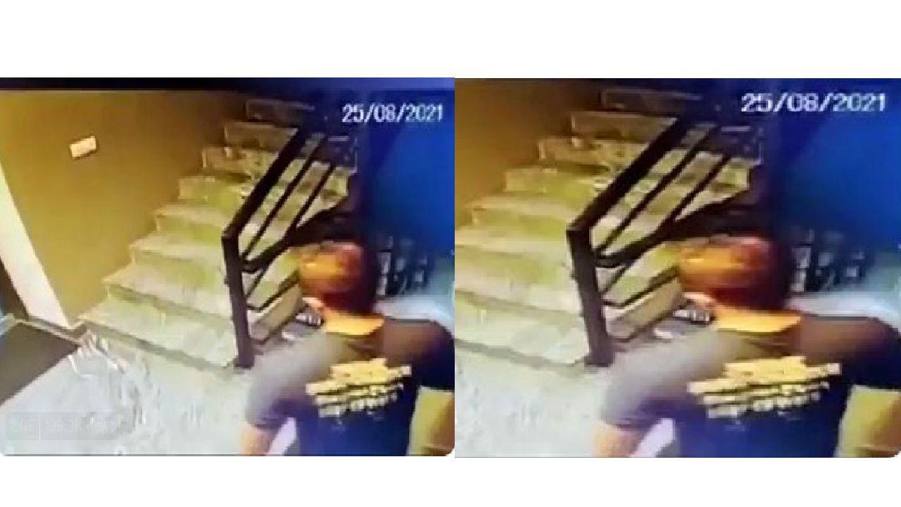 man collapsing on staircase