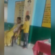 student massaging teacher