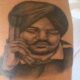 Sidhu Moose Wala's face tattooed