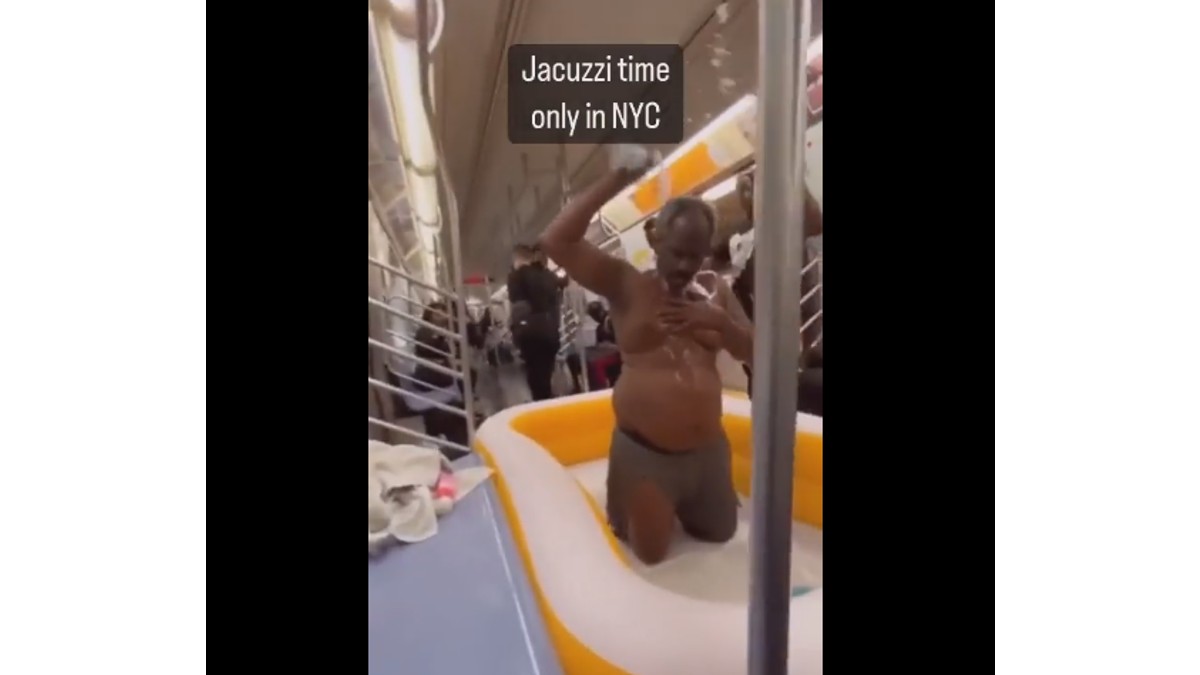 Homeless man takes bath inside metro