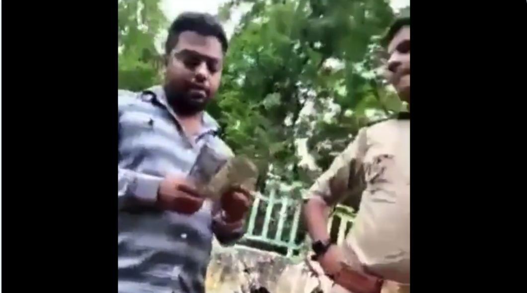 Noida police officer taking bribery