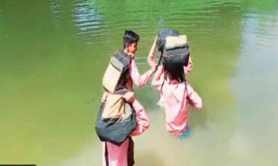 School kids crossing lake in Jhansi