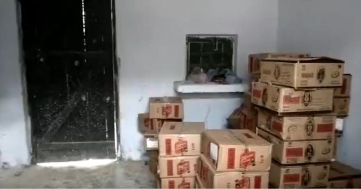 uttar pradesh  government school stores 51 cartons illicit liquor in kushinagar