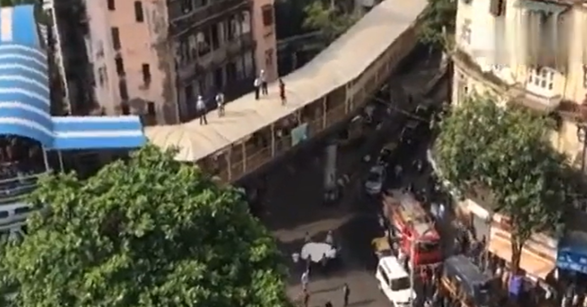 drunk man climbs skywalk in mumbai to commit suicide  police foil his plan   watch